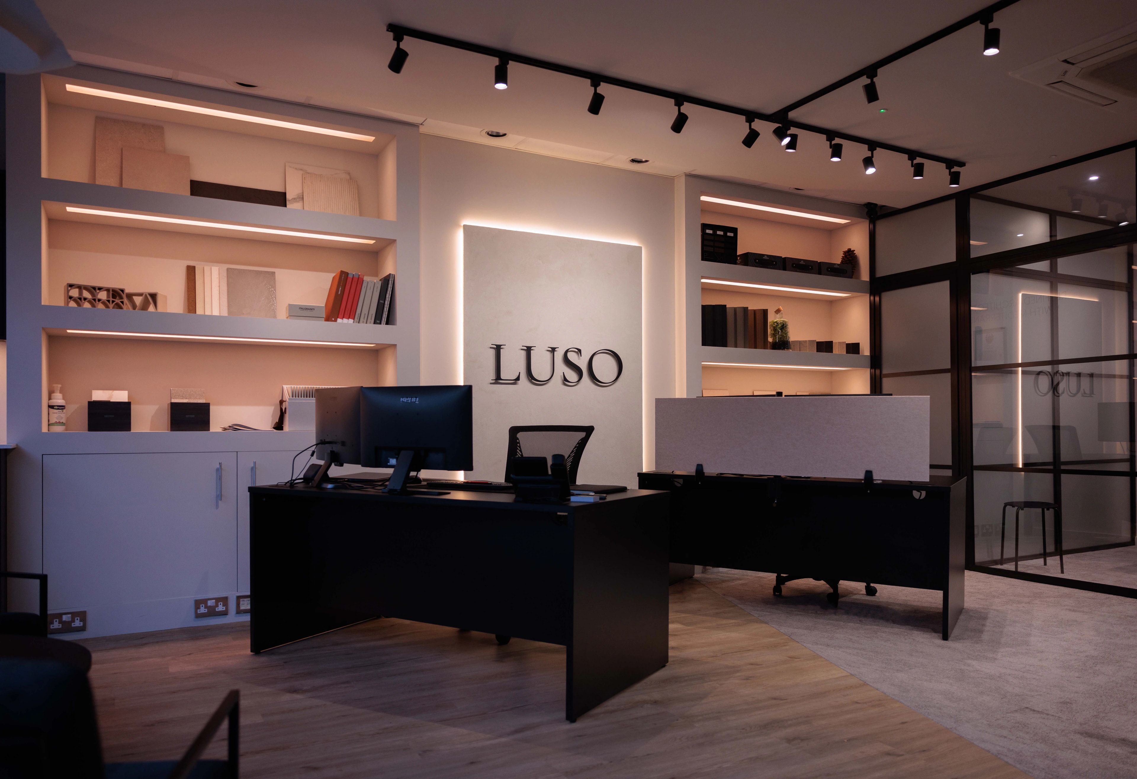 Inside the LUSO Architecture studio in Canford Cliffs, with material samples and drawings